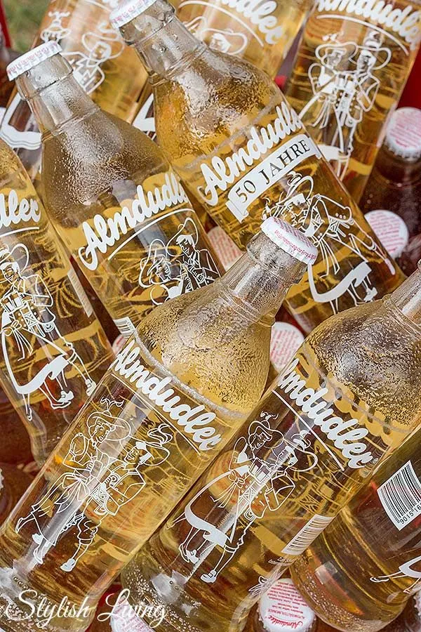 Almdudler, a traditional Austrian herbal soft drink, often enjoyed with typical Austrian dishes.