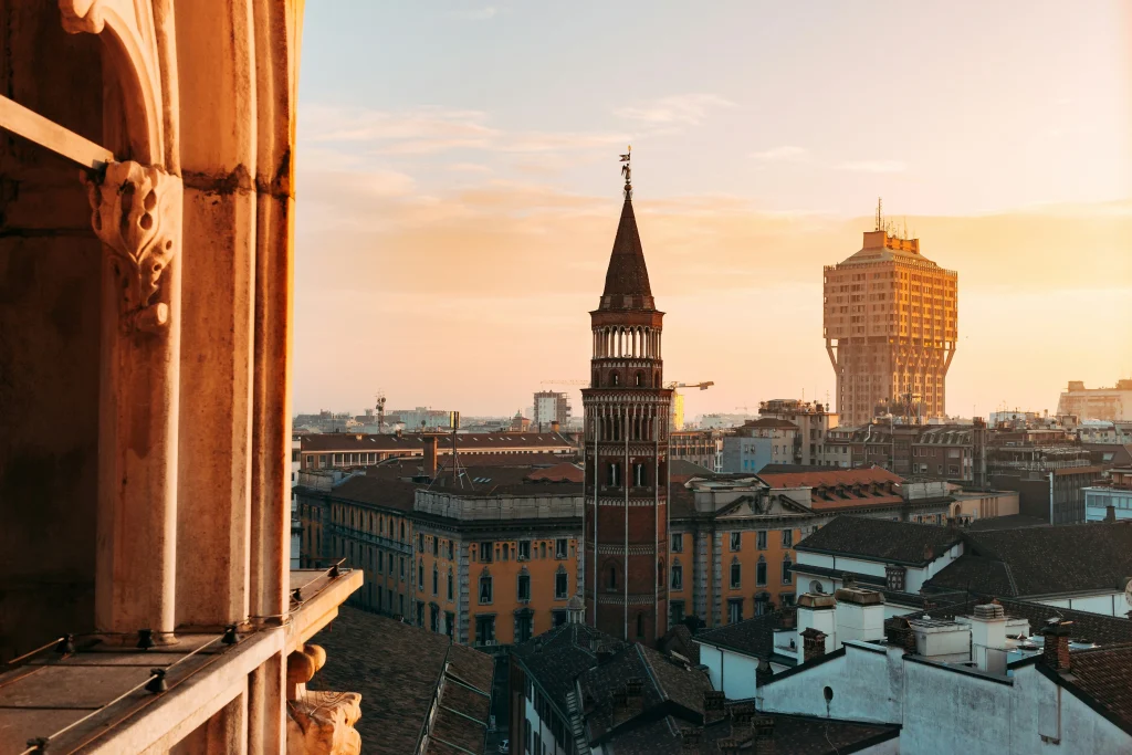 Modern and historic buildings in Milan, a key city for buying a property in Italy for business or residence.