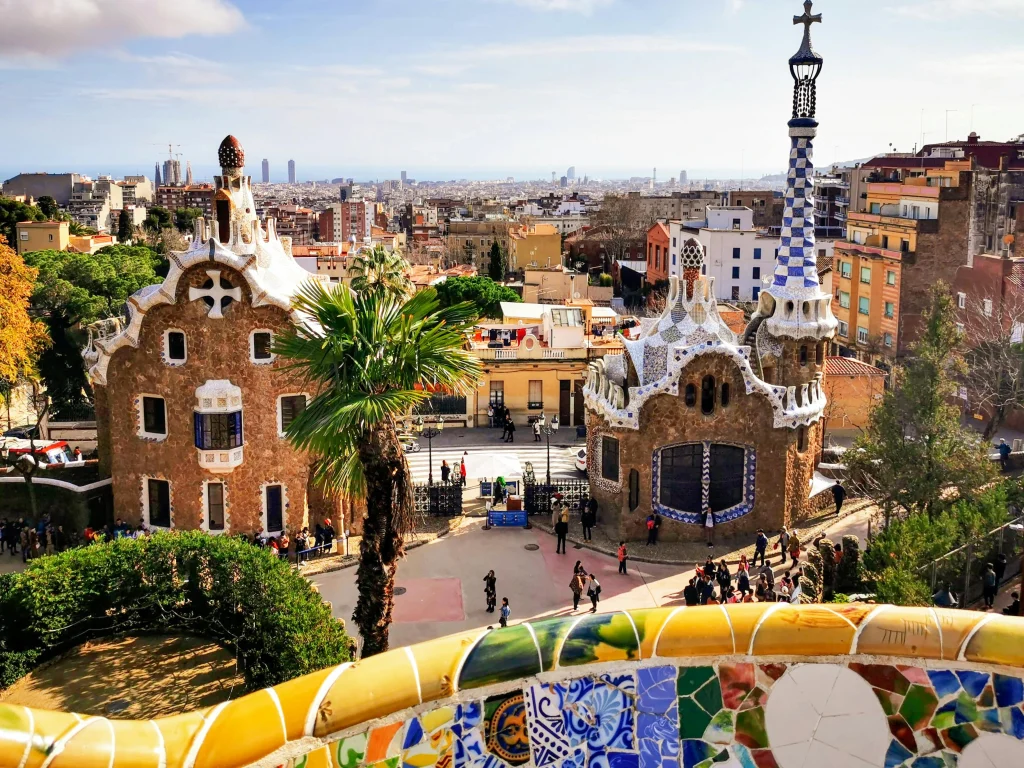 The colourful and artistic Park Güell, designed by Antoni Gaudí, offering a breath-taking view of the city with its iconic mosaic-covered architecture.