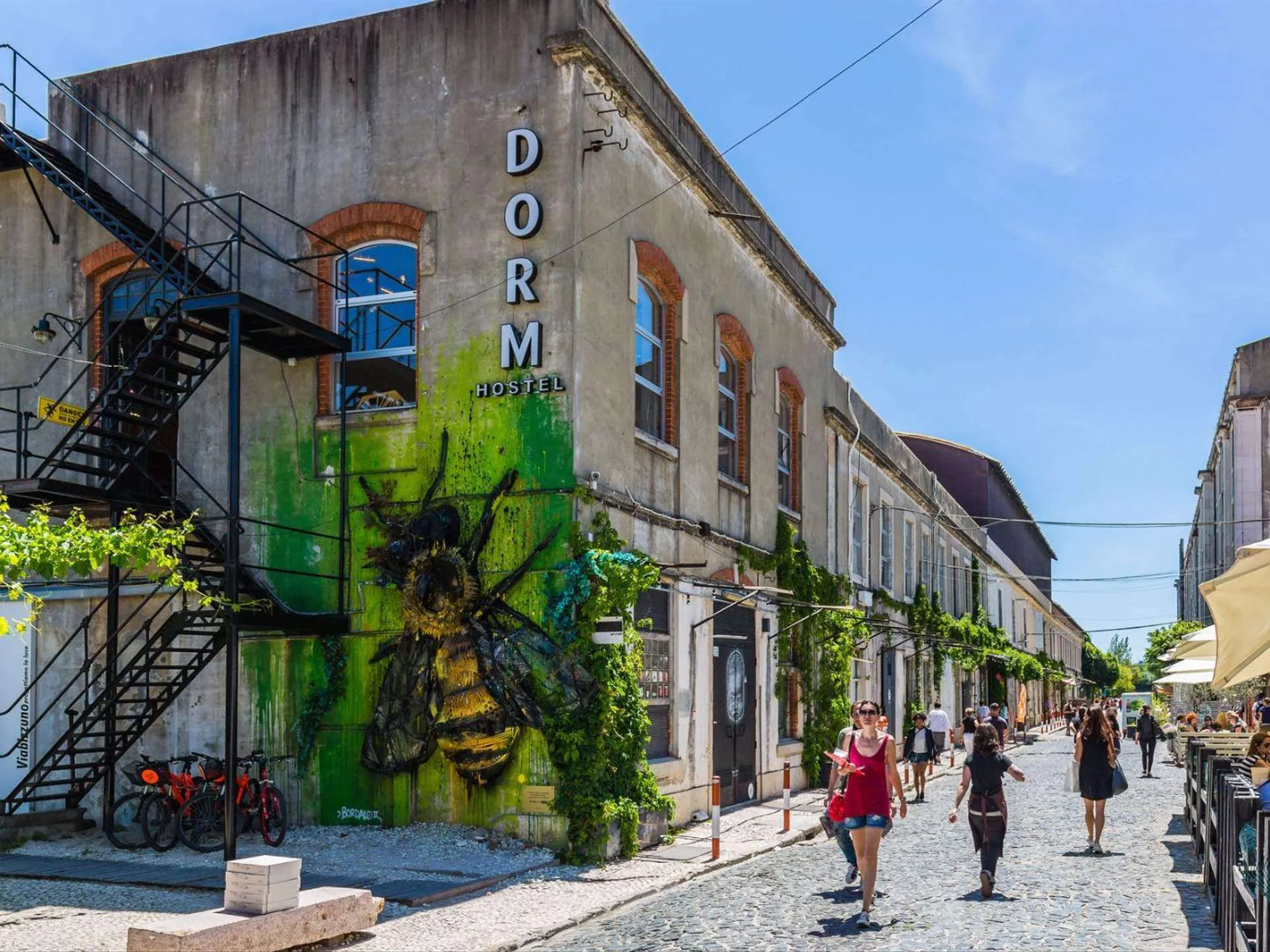 What to do in Lisbon? Explore the LX Factory, a vibrant creative hub with trendy shops, street art, cafés, and a dynamic atmosphere in Lisbon’s Alcântara district.