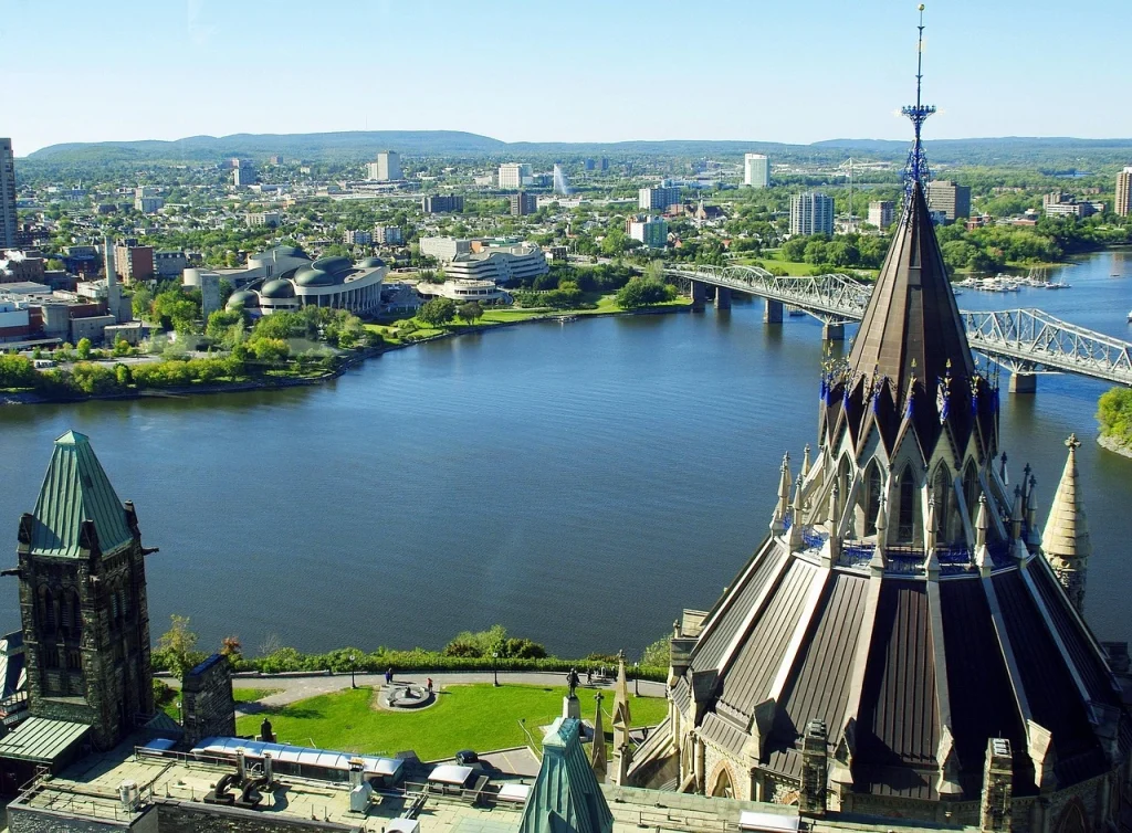 Aerial view of Ottawa’s Parliament and river, reflecting its charm as one of the best places to live in Canada for history, culture, and quality of life.