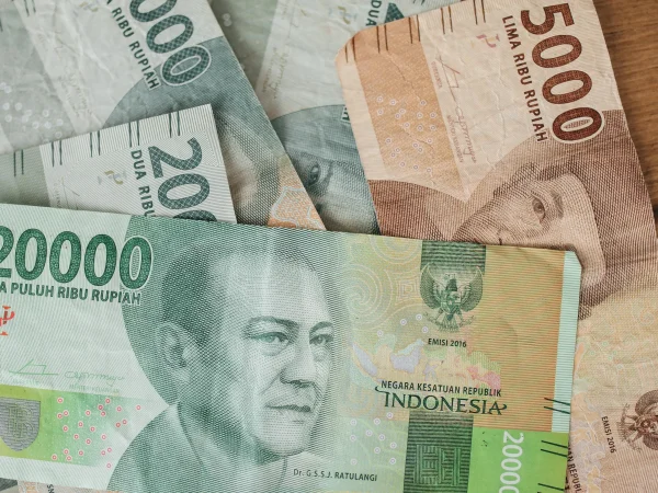 Various denominations of Indonesian Rupiah currency used for deposits and withdrawals with an Indonesian Bank Account.