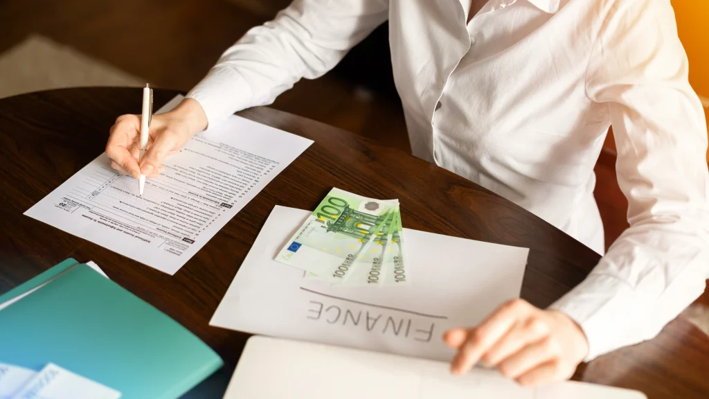 Woman going over her Dubai taxes in 2025