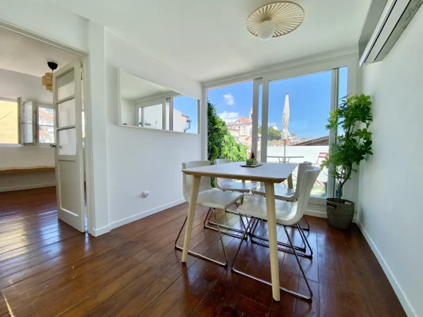 Dining area of one of the Bleisured's apartment in Lisbon.