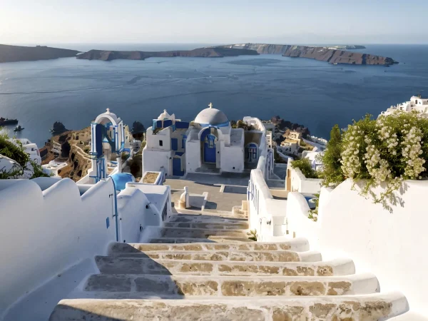 Santorini panorama: steps, Greek church, and blue caldera.