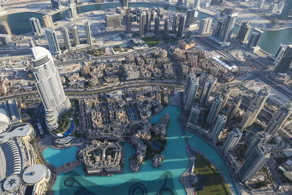Aerial view of Downtown Dubai with modern towers around Burj Lake and Dubai’s housing district.