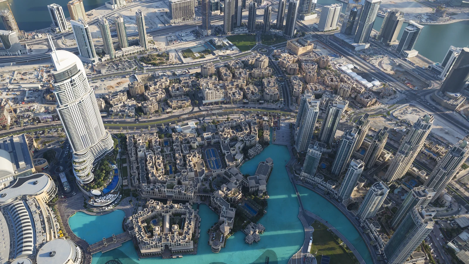 Aerial view of Downtown Dubai with modern towers around Burj Lake and Dubai’s housing district.